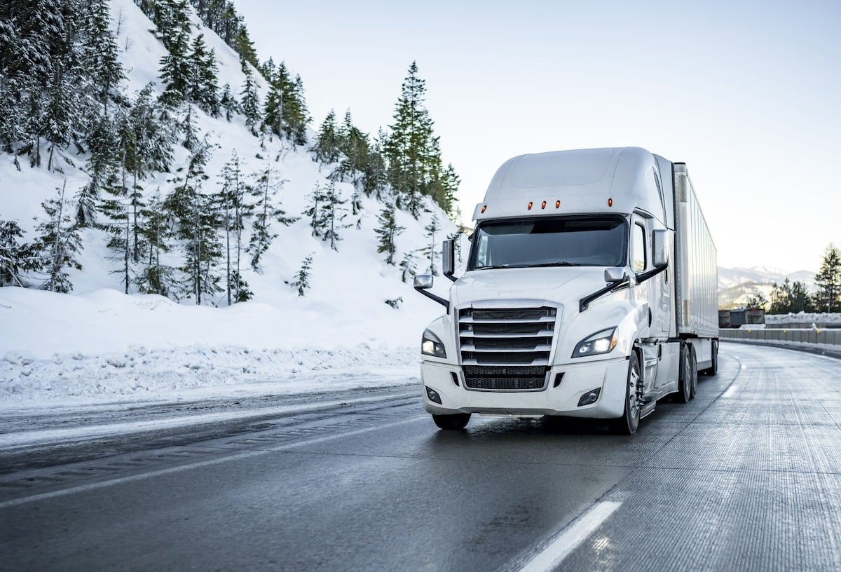 White Freight Truck Driving Over Colorado Mountain Pass